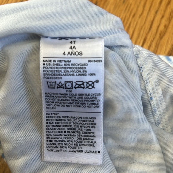 Old Navy girls striped ruffle swimsuit. Blue and white vertical stripe - Picture 7 of 8